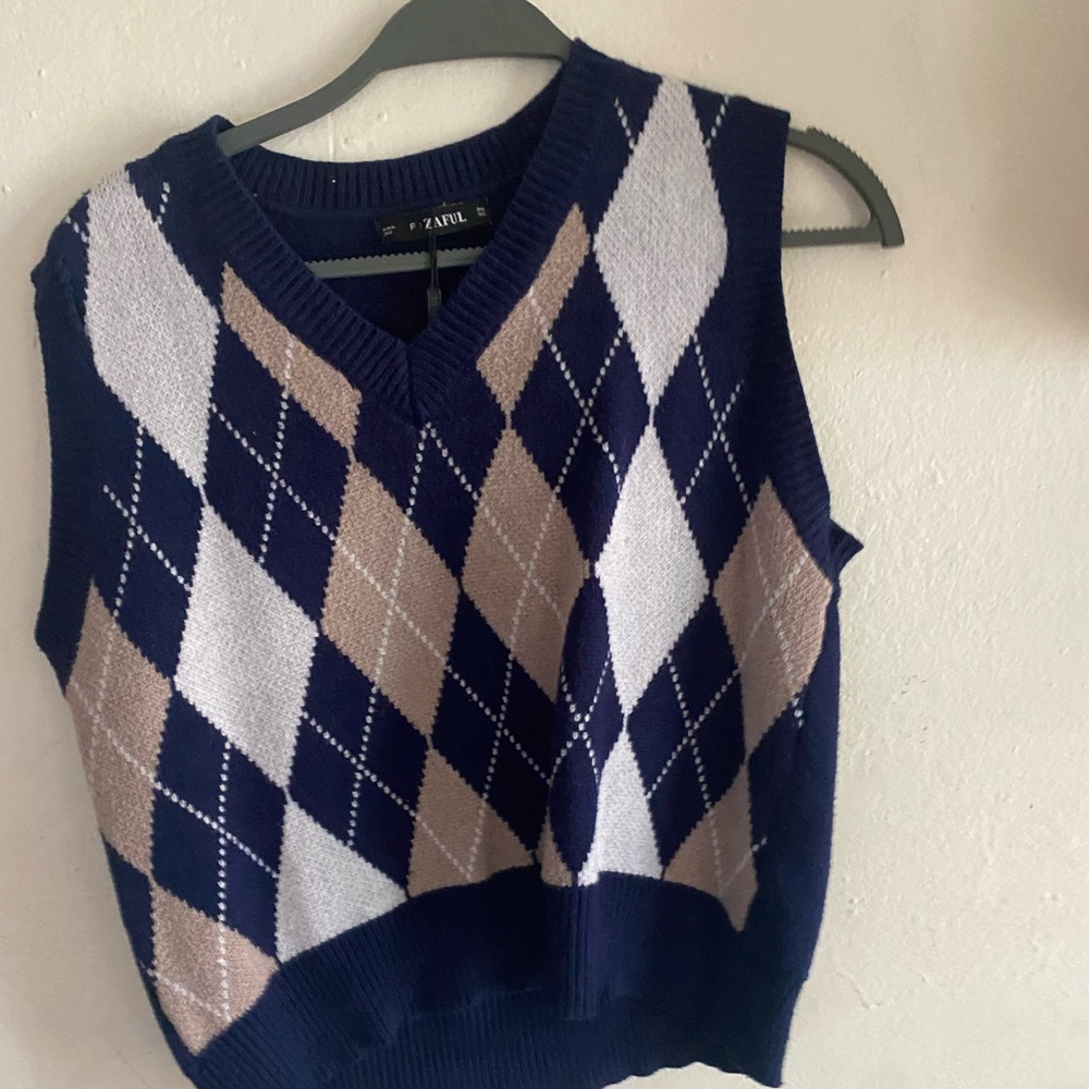 Cropped blue sweater vest